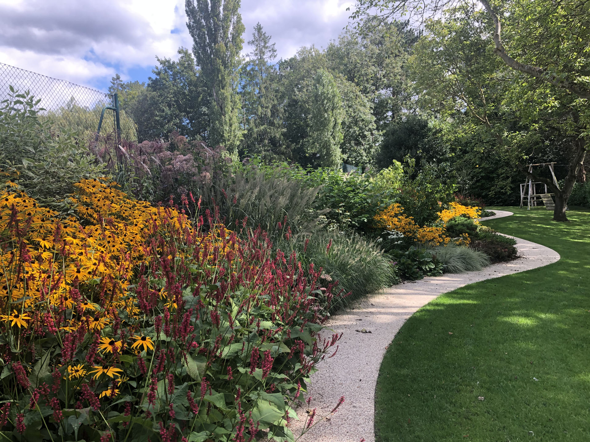 Winding Pathway with soft Vibrant planting, Essex